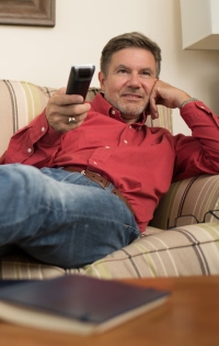 Client Relaxing in His Bedroom
