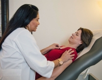 Dr. Gloria Dunkin Working with a Patient